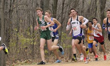 Justin Clarke improves 26 places, slices 25 seconds off his time in his third state meet CC run