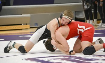 Henning places sixth in wrestling
