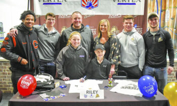 Seven-year-old Riley Einck signs with Southwest Minnesota State University