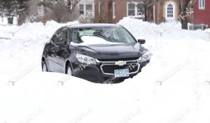 snow.buried car
